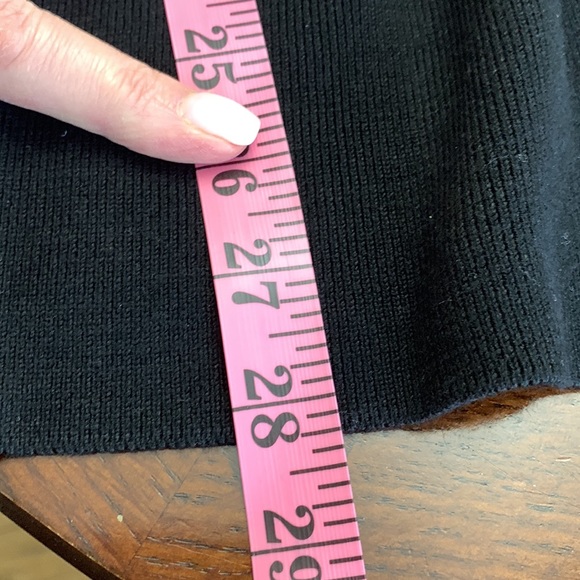 Black V neck Fever sweater with flaired sleeves and around hips. - Picture 8 of 8